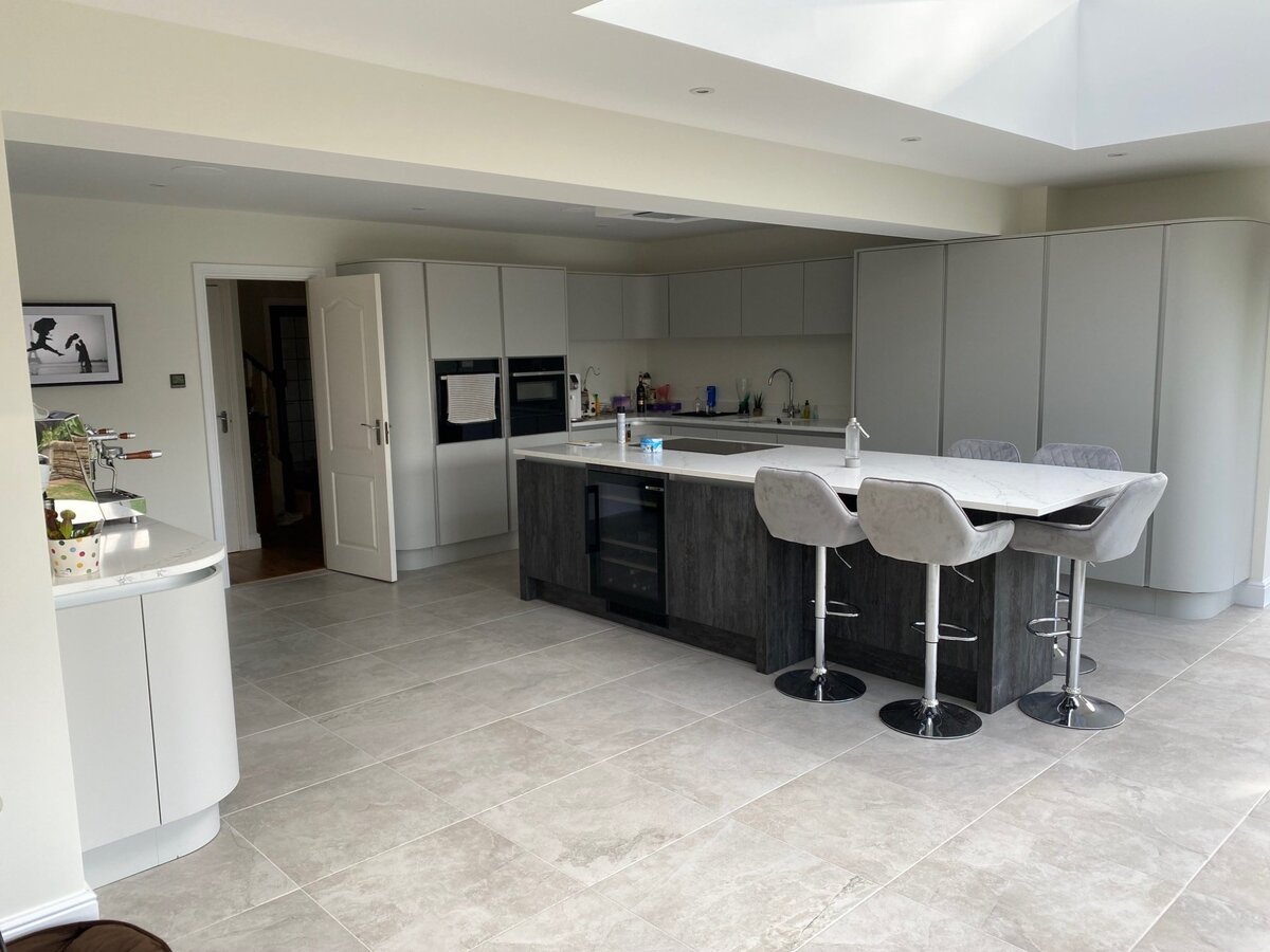 High spec kitchen with island and bar stools