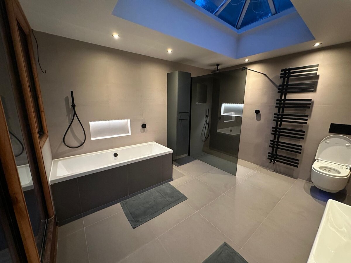 Luxury bathroom wet room with heated towel rail